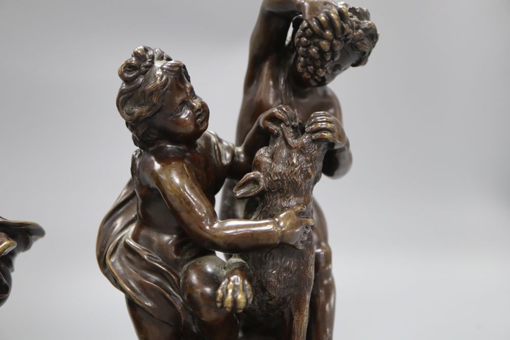 A pair of neo-classical style bronzes of children and a monkey, height 22cm